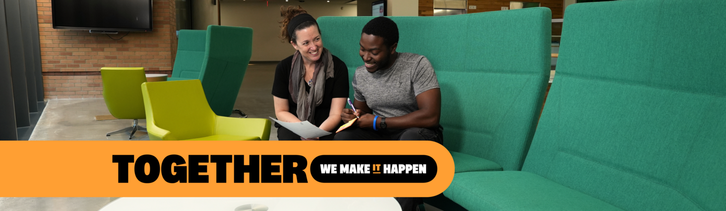 Student and USG staff member sitting