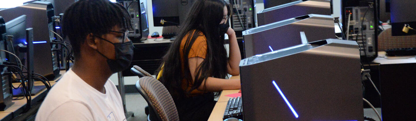Students on computers Students on computers