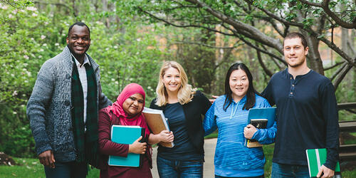 4 students walking together