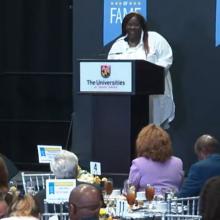Nadine Dogbo speaking at Montgomery County Business Hall of Fame event